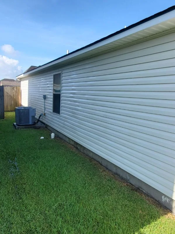 The same siding wall after washing